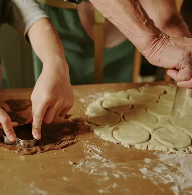 Hands baking cookies