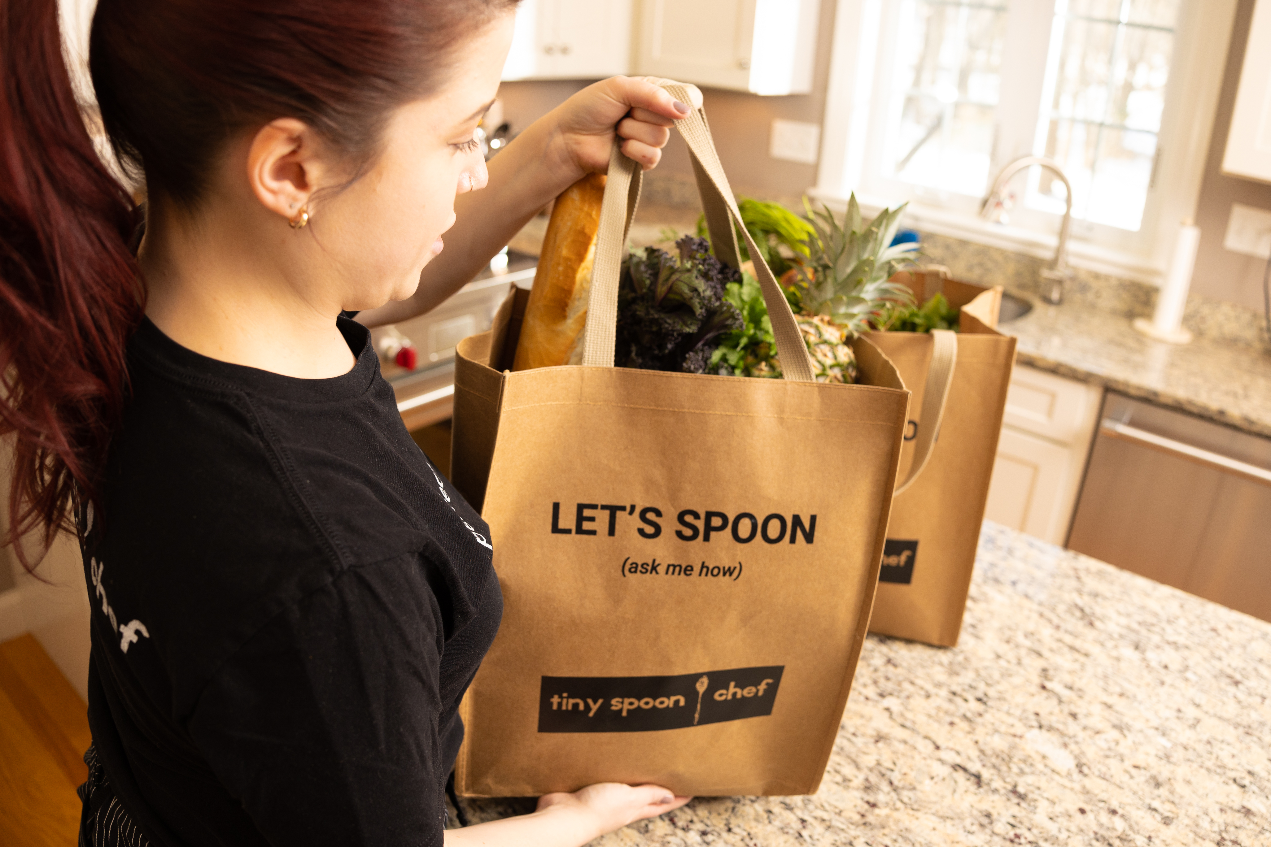 Personal chef bringing groceries to cook for a Dallas-Fort Worth client